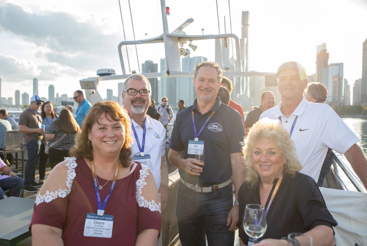 Attendees on boat smiling