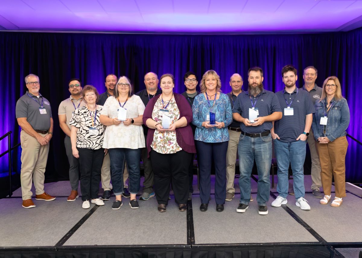 4 award winners and B&L leadership